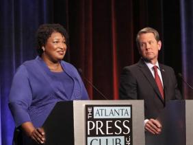 Stacey Abrams and Brian Kemp in a debate for the 2018 midterms