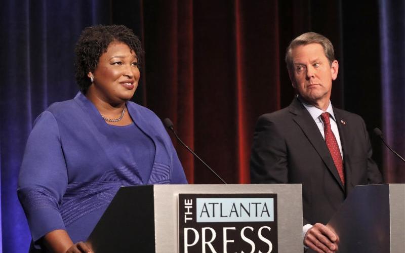 Stacey Abrams and Brian Kemp in a debate for the 2018 midterms