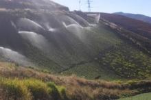 Sprinkler irrigation in steep field